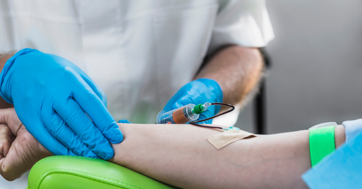 health care worker drawing blood